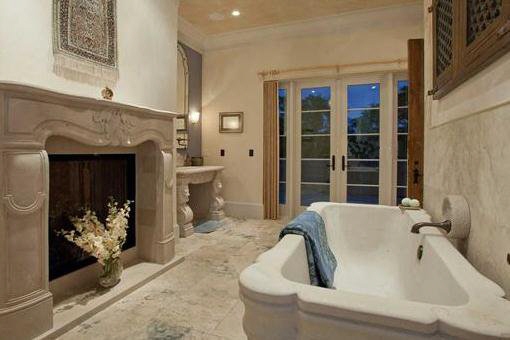 Luxury bathroom with fireplace