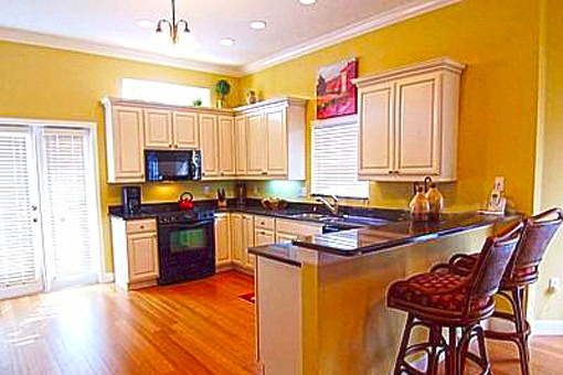 Beautiful open style kitchen with top line appliances