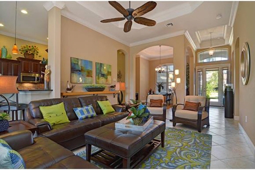 Luxurious living room with ceiling fan in Fort Myers