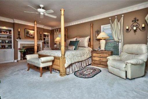 Luxurious bedroom with fireplace